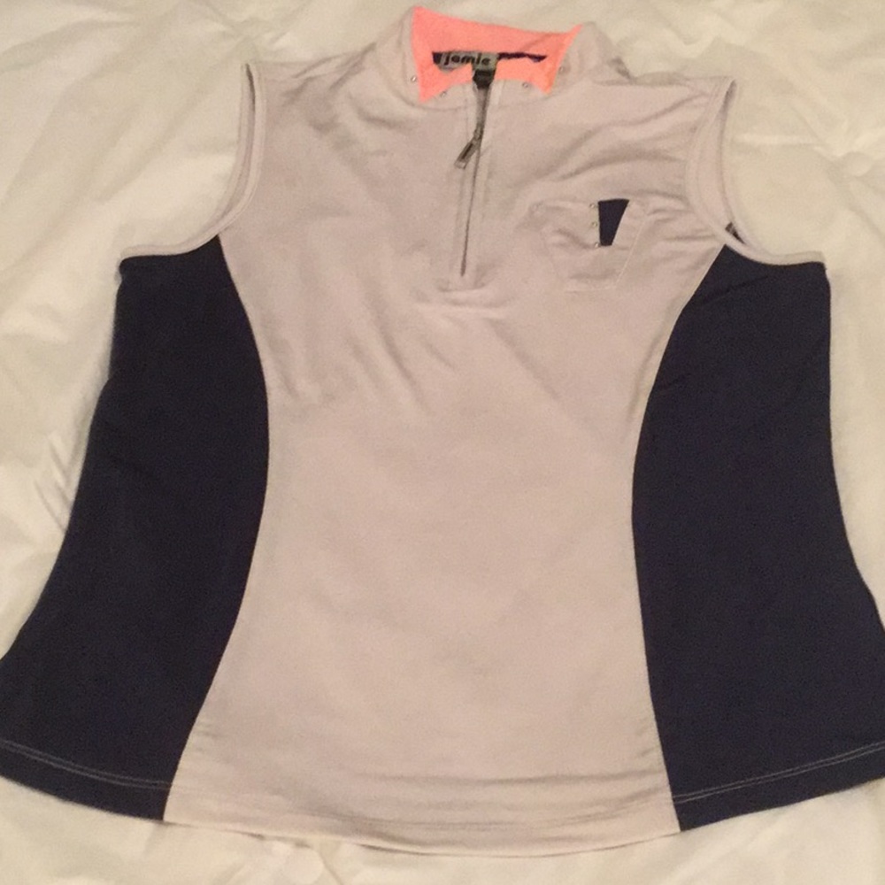 Jamie Sadock black and tan sleeveless golf shirt.